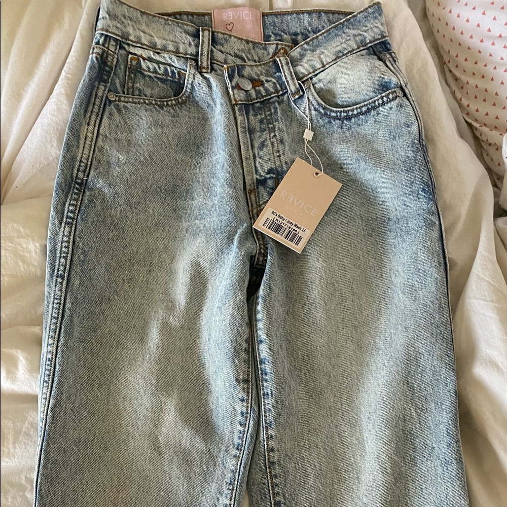 revice denim straight light wash jeans with cross button, price is negotiable